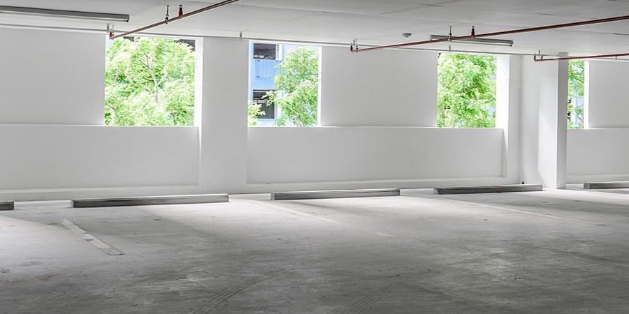 This image shows a concrete-coated floor in a commercial space.