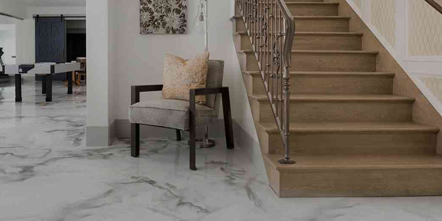 This image shows a living room with a white and gray metallic epoxy floor.