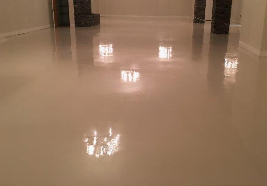 This image shows a garage with an epoxy floor.