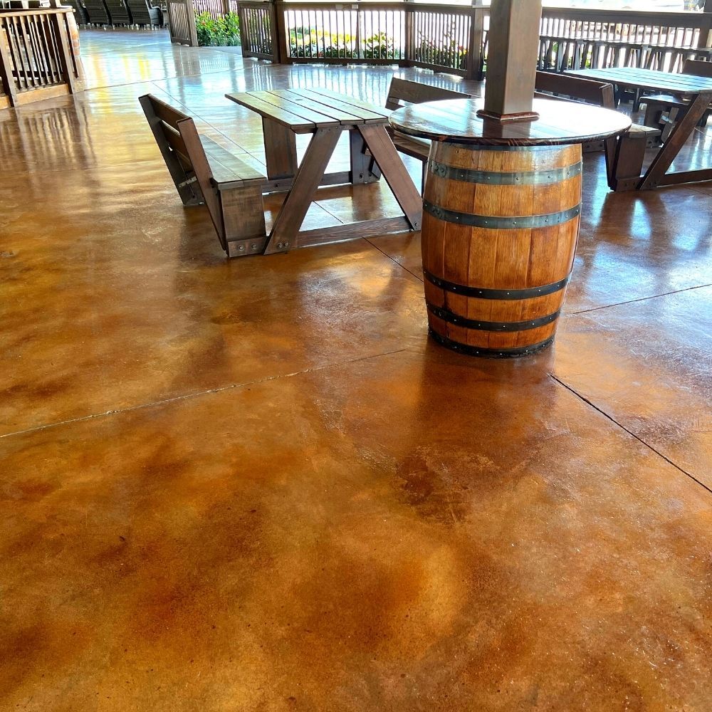 This image shows a concrete-coated floor in a commercial space.