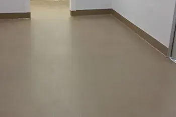 garage-flooring-1-480x320-1 This image shows a brown epoxy floor.